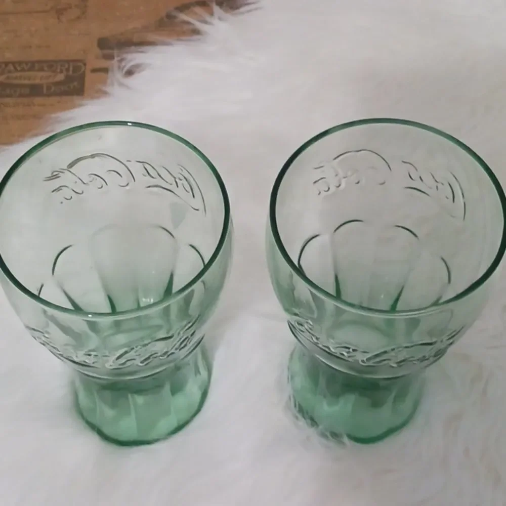 Pair of vintage green glass Coca Cola